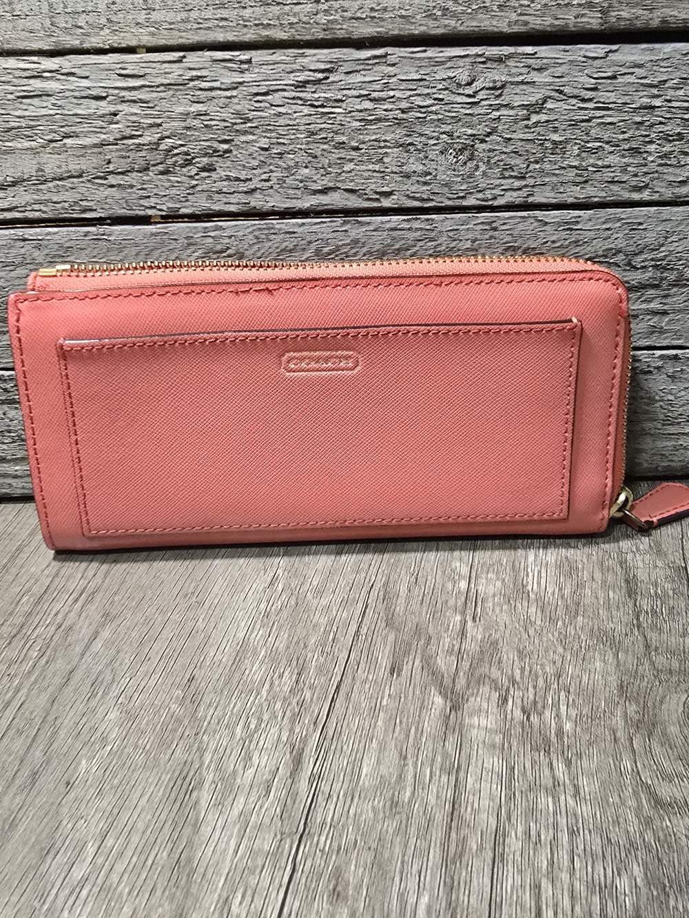 Coach Darcy Saffiano leather zip-around wallet.